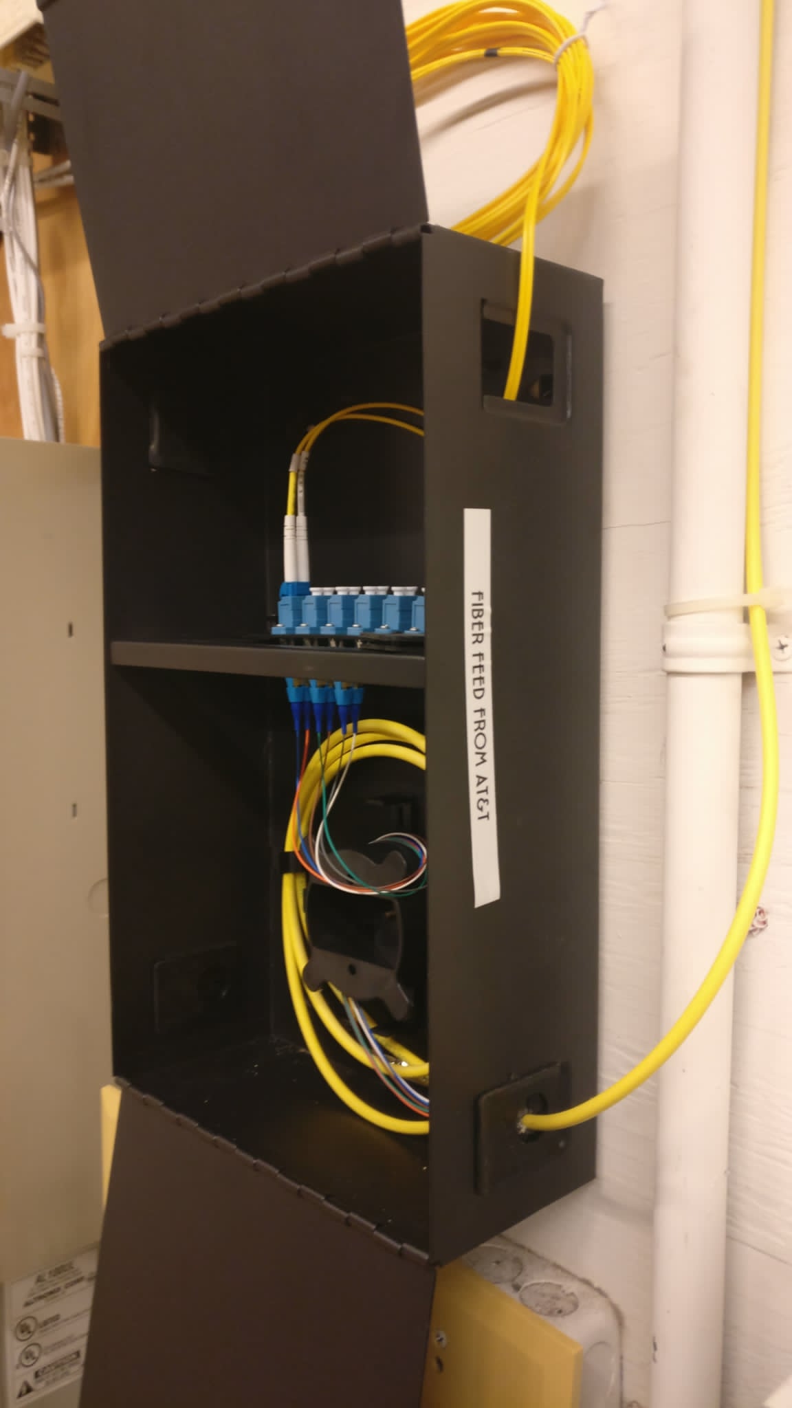 Fiber optic feed enclosure installation